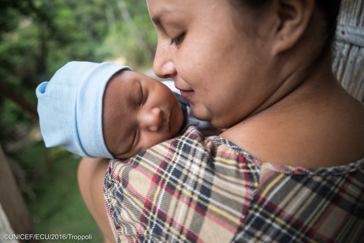 On June 29th 2016, Yadira Zambrano (19) looks proudly at her baby, Elias Garcia Zambrano (1 month). After an emotional and worrisome pregnancy process, Yadira is happy that Elias was born healthy and did not show signs of microcephaly or any neurological complication. The Ministry of Health performs a follow up process with all newborns. Elias will have his first appointment on the first week of July. Bijagual, Manabí, Ecuador.