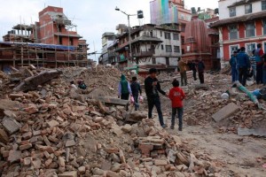 On 26 April, people walk around the historic Durbar Square destroyed by the earthquake on 25 April in Katmandu, the capital of Nepal. On 27 April 2015 in Nepal, relief operations continue in the aftermath of the massive 7.9 magnitude earthquake that hit the country on 25 April. The quakes epicentre was 80 kilometres from Kathmandu, the capital. The Government has declared a state of emergency in 35 affected districts in the country, where more than 1.3 million people  over half of whom are children  have been affected. More than 5,000 people have been estimated killed and 50,000 have been injured. Homes and vital infrastructure, including hospitals, have been severely damaged or destroyed, leaving thousands of children and families homeless, vulnerable and in urgent need of food, shelter, safe water, and sanitation and health support. Most of the displaced are sheltering in camps or in available open spaces. The situation has been continuing powerful aftershocks that have caused additional damage. Working with the Government and other partners, including fellow United Nations organizations, UNICEF is supporting water, sanitation and hygiene (WASH), health, nutrition, child protection, and education interventions. In response to the disaster, UNICEF is providing hospitals tents, tarpaulin sheeting, emergency medical kits, vaccines and related supplies, zinc and oral rehydration salts to prevent diarrhoeal disease outbreaks, and temporary learning spaces and psychosocial counselling for children. UNICEF is also procuring emergency health kits, and is supporting water trucking services in camps for the displaced.
