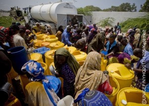 On 27 July, people collect water during a distribution in a camp for people displaced by the drought, in Mogadishu, the capital. The water is being distributed by troops from AMISOM (the African Union Mission in Somalia) from their base supplies. AMISOM was established by the United Nations to support peace, stability and the safe delivery of humanitarian aid in the country. UNICEF works on all sides of the long-running conflict. By 29 July 2011, the crisis in the Horn of Africa affecting primarily Kenya, Somalia, Ethiopia and Djibouti continues, with a worsening drought, rising food prices and an ongoing conflict in Somalia. More than 12 million people are threatened by the regions worst drought in 60 years. Some 500,000 severely malnourished children in drought-affected areas are at imminent risk of dying, while a further 1.6 million moderately malnourished children and the wider-affected population are at high risk of disease. Somalia faces one of the worlds most severe food security crises; and as many as 100,000 displaced people have sought security and assistance in Mogadishu, the still-embattled capital, in the last two months, and tens of thousands are fleeing into Kenya and Ethiopia. Famine has been declared in the Lower Shabelle and Bakool areas, and it is believed all of Southern Somalia could fall into a state of famine without immediate intervention. Across Southern Somalia, 1.25 million children are in urgent need of life-saving assistance, and 640,000 are acutely malnourished. UNICEF has delivered supplementary feeding supplies for 65,000 children and therapeutic food for 16,000 severely malnourished children in Southern Somalia, and is working with UN, NGO and community partners to expand blanket supplementary feeding programmes where needed. UNICEF is also supporting a range of other interventions, including an immunization campaign targeting 40,000 children in Mogadishu. A joint United Nations appeal for humanitarian assistance for the region requires US$2.5 billion, less than half of which has been committed.