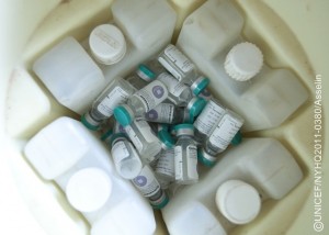 Pentavalent vaccines are kept in a cold box at the health centre in Kaniaka Village, Katanga Province. The pentavalent vaccine protects against five common diseases: diphtheria, tetanus, pertussis (whooping cough), hepatitis B and Haemophilus influenza type b (also called Hib, a cause of pneumonia and meningitis). Cold boxes are a critical part of the cold chain, the series of temperature controls required to maintain vaccine potency from manufacture through inoculation. In February 2011 in the Democratic Republic of the Congo, women and children remain vulnerable to maternal and neonatal tetanus (MNT), an infection that has no cure but is preventable with routine immunization. MNT threatens the lives of 130 million women and babies in 38 countries around the world, including D. R. Congo, where the disease sickened at least 1,038 babies and killed 483 last year. Globally, the disease kills 59,000 infants within their first month of life, the equivalent of one death every nine minutes, every year. Limited access to basic health services and poor hygiene conditions during birth are the major contributors to MNT mortality: Many infections take place when women give birth at home, alone or in the presence of an untrained birth attendant. Delivery on unclean surfaces and handling with unclean hands or instruments increase the chance of MNT infection in both mother and baby. Yet three doses of the tetanus toxoid vaccine  one of the worlds safest and least expensive vaccines  protects almost 100 per cent of recipients from the disease. Additionally, children born to immunized women are protected from the disease for the first two months of life. Since UNICEF re-launched its MNT Elimination Initiative in 1999, at least 20 countries have achieved the goal of eliminating MNT, and since 2006, private-sector partner Pampers has donated funds for 300 million vaccines. In D. R. Congo, this initiative is promoting vaccination among girls and women of child-bearing age, particularly in southern provinces where health infrastructure is weak and vaccine shortages are common. The goal of the initiative is to eliminate cases of MNT from the world by 2015.