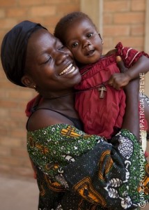 A woman living with HIV embraces her daughter in the maternal and child health unit at Moundou Hostpial in Moundou, the capital of Logone Occidental Region. The woman participated in a UNICEF-supported programme to prevent mother-to-child transmission of HIV (PMTCT). Her daughter is HIV-negative.  In April 2011 in Chad, malnutrition  a preventable condition  remains one of the greatest threats to childrens right to survival and development. One out of every five of Chads children dies before her/his fifth birthday. More than 100,000 of the countrys children aged 05 are malnourished, and 1 out of every 10,000 dies each day. Though chronic food insecurity is the main underlying cause of malnutrition, widespread poverty, rising food prices, desertification and climate change all play a part in this silent emergency. UNICEF is working with the Ministry of Health and other partners to improve community-based interventions structured around 205 nutrition centres throughout Chads Sahel belt. Between January and October 2011, these centres treated approximately 56,000 under-five children suffering from severe acute malnutrition. The effects of chronic malnutrition have only been exacerbated by conflict  both internal and external  that has left hundreds of thousands of internally displaced persons as well as refugees from Sudan and the Central African Republic dependent upon aid for survival. In addition to nutrition, UNICEF is also supporting programmes in other vital sectors, including education, health care, WASH (water, sanitation and hygiene) and child protection, for both Chadian and refugee communities. UNICEF is requesting US$46.4 million to continue ongoing assistance for the countrys most vulnerable in 2012.