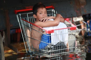 A boy displaced by Typhoon Haiyan (local name Yolanda) in the city of Tacloban, Leyte, Philippines. UNICEF calls for support to be able to respond to the needs of all children and families affected.
