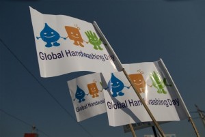 Children wave flags at the Global Handwashing Day in Bhubaneswar, Orissa, India. Tom Sampson/UNICEF Oct 09