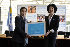 On 29 April 2010, (left-right) UNICEF Representative in China Yin Yin Nwe and newly appointed UNICEF Goodwill (China) Ambassador Maggie Cheung hold a certificate formalizing Ms. Cheungs appointment, at a ceremony in Beijing, the capital. I have long respected the work of UNICEF in different parts of the world, said Ms. Cheung. I am greatly honoured by this new role as a spokesperson and advocate for the most vulnerable children in China, and looking forward to helping to improve public awareness on critical issues facing children.  In April 2010 in China, acclaimed international actress and newly appointed UNICEF Goodwill Ambassador (China) Maggie Cheung visited children and women affected by HIV/AIDS in Ruili City, in the south-western province of Yunnan. Although China has relatively low rates of HIV infection, the risk of transmission is significantly higher in parts of Yunnan Province, which borders major opium producing regions in neighbouring countries. HIV prevalence is 0.1 per cent nationally, but rises to 20 per cent among intravenous drug users in Yunnan. The disease remains highly stigmatized and poorly understood by much of the population, factors that could accelerate the spread of the epidemic, particularly among the rural poor, migrants, sex workers and injecting drug users. On 29 April, Ms. Cheung was appointed a UNICEF Goodwill Ambassador to advocate on behalf of vulnerable children, including those affected by HIV/AIDS and disability. Her visit to Yunnan aimed to raise awareness of HIV/AIDS and to mitigate stigma associated with the disease. By the end of 2007, an estimated 700,000 Chinese were HIV-positive.