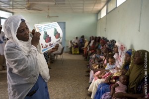 Social worker Oumarou Zeïnabou conducts an awareness session for women, many holding their infants on their laps, at the Zinder Maternity Centre for Integrated Health, in Zinder, capital of Zinder Region. Ms. Zeïnabou is holding an educational flipchart bearing illustrations of two women, one feeding and one breastfeeding her infant, as well as a variety of nutritious foods. The chart says, in French, Your sick child should eat and breastfeed more than is typical in order to heal and avoid malnutrition.  In May 2013, Niger continues to host an estimated 50,000 Malian refugees  further constraining the countrys already limited resources. Both Niger and Mali are among nine countries in the Sahel region  also including Burkina Faso, Chad, the Gambia, Mauritania, Senegal, and the northern parts of Cameroon and Nigeria  facing a severe food and nutrition crisis. The emergency is the result of repeated drought-related food shortages. Though conditions have improved since the height of the crisis in early 2012, an estimated 3.1 million people in the Niger are affected by food insecurity, including over 376,700 children under age 5 suffering from severe acute malnutrition. In April, ongoing wet feeding activities benefitted 5,769 children aged 6 to 59 months in four refugee camps. UNICEF is also supporting programmes in education and child protection, including the provision of child-friendly spaces, in the camps. Initiatives to provide safe water and sanitation facilities to refugees are extending to some host communities, and responses to a recently declared cholera epidemic are also ongoing. To continue emergency responses throughout 2013, UNICEF requires nearly US$33.8 million, of which half remained unfunded by 22 May.