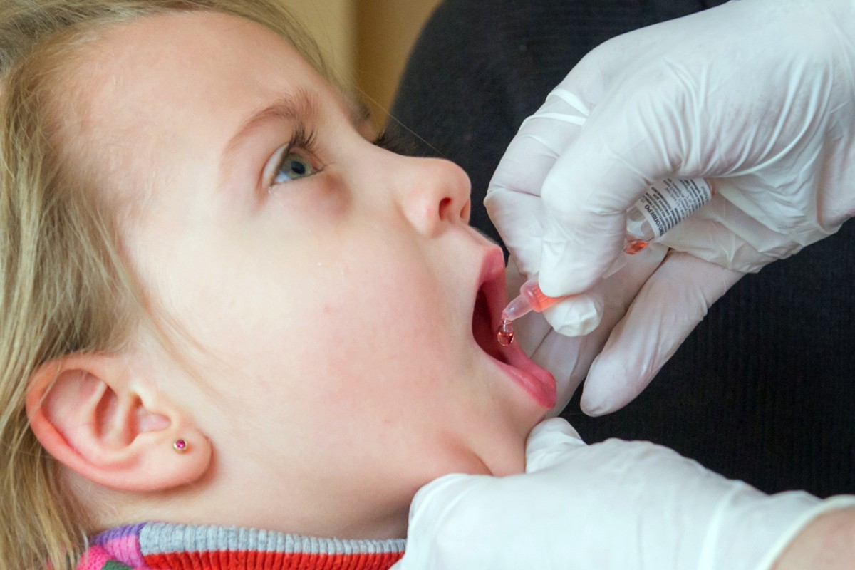 On 29 January 2016, a girl gets her oral polio vaccine in the childrens municipal policlinics in the city of Chernomorsk, Odesa region. In total, 4.7 million Ukrainian children should be immunized against polio during the nationwide campaign this month.

A chance to wipe out polio: Ukraine started the third round of polio vaccination campaign.
On 1 September 2015, a polio outbreak was confirmed in Ukraine. Two cases of circulating vaccine-derived poliovirus were confirmed in children living in Zakarpattya region in south-western Ukraine, which borders with Poland, Slovakia, Hungary, and Romania. Both children, one aged 10 months and the other aged 4 years, were not vaccinated against polio and became paralysed after contracting a poliovirus. 

This is the first polio outbreak to hit Ukraine in 19 years. It puts childrens lives at risk and undermines Europes polio-free status. The outbreak occurred because of the chronically low immunization coverage in the country. Routine immunization coverage rates in Ukraine have fallen dramatically in the past five years to as low as 50 per cent. As documented by a multi-agency immunization programme review, low coverage was initially triggered by public distrust and later aggravated by insufficient vaccine supply. Low immunisation coverage has been amplified by the ongoing conflict and large-scale population displacement in eastern Ukraine.

UNICEF together with partners supported the Ministry of Health of Ukraine to conduct nationwide immunization of children for at least three rounds to stop circulation of the poliovirus. The first two rounds targeted 2.8 million children aged 2 months to 6 years. On 25 January 2016, the third round started targeting children aged 2 months to 10 years. A total of 4.7 million children should be immunized during the nationwide campaign in Ukraine. 

To support the polio outbreak response, UNICEF has been implementing communication and social mobilization campaign to get children vacc