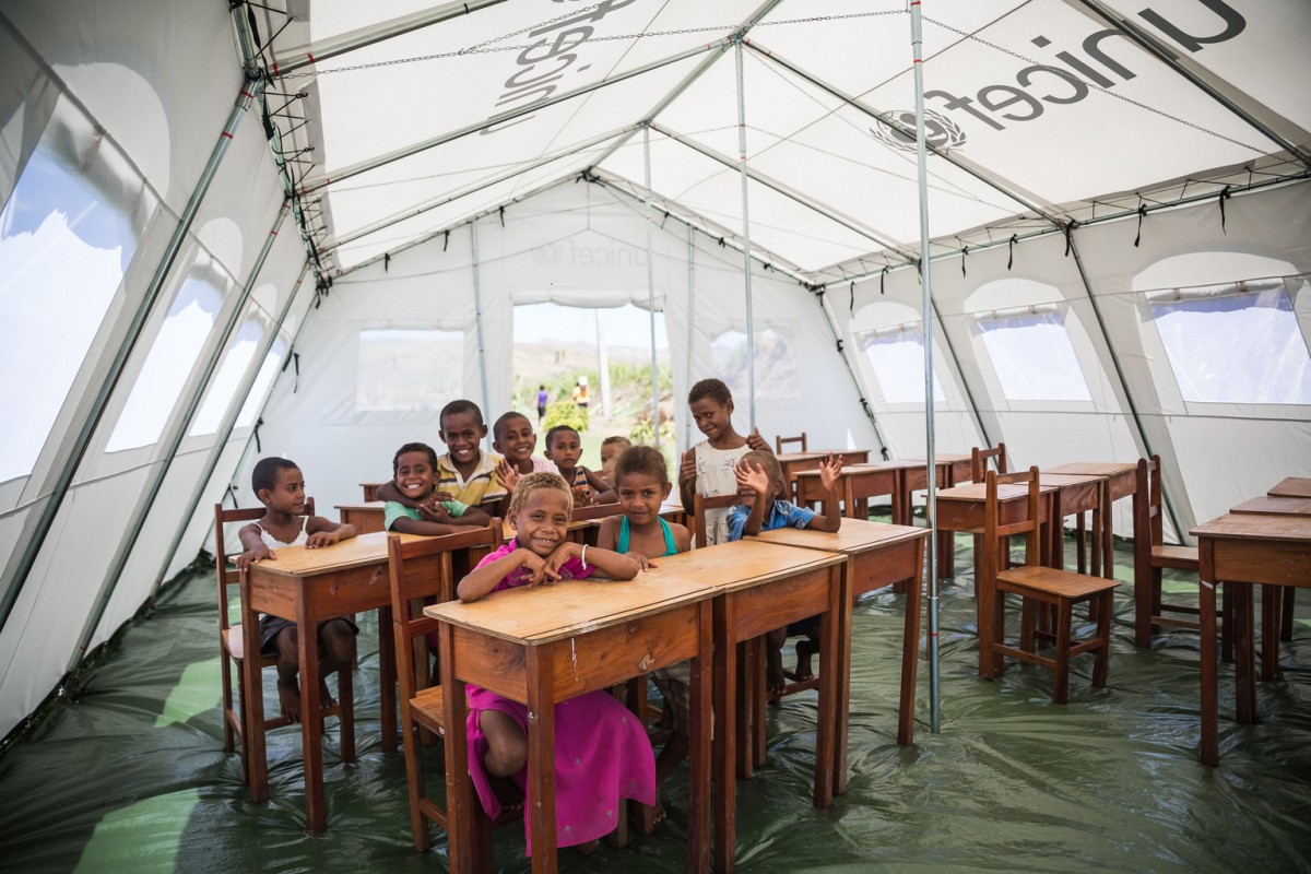 On 29 February 2016 , Students from Muslim Primary School in Dobuilevu village, Ra Province can't wait to start school again. The school was destroyed by Cyclone Winston. UNICEF gave to the school two school tents and teaching and learning materials.

Category 5 Tropical Cyclone Winston made landfall in Fiji on Saturday 20 February, continuing its path of destruction into Sunday 21 February. A state of natural disaster and a nationwide curfew had been declared by the Government of Fiji earlier in the evening. In the wake of Cyclone Winston, UNICEF's main concern is for children, pregnant women and breastfeeding mothers across Fiji. Little is yet known about the status of communities living on the outer islands of Fiji that were directly under the eye of Tropical Cyclone Winston- as communications remain down for many. The Fijian Government is rapidly working to assess the overall situation in order to pinpoint the critical needs. The Fijian Government has declared a state of natural disaster for the next 30 days and has initiated the clean-up process by clearing the huge amounts of debris scattered everywhere. UNICEF staff members are standing by to assist as required.