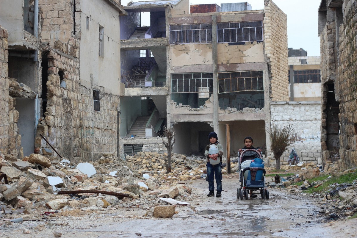 On 27 December 2016 in east Aleppo City in the Syrian Arab Republic, Hasan (right), 10, collects water for his family in Shakoor neighbourhood.  Hasan and his friends try to find some fun in their daily water fetching routine I like to play with my friends when we collect water, says Hasan. A couple of months ago, shrapnel hit Hasans neck.  The injury eventually affected the movement of the right part of his body. My hand is slightly tilted all the time because of the shrapnel in my neck. I usually use my left hand to carry the jerry can," says Hasan.

For the tens of thousands people returning to some neighbourhoods in east Aleppo City, getting clean and running water is a challenge.  The fighting has damaged most of the water infrastructure in the city.  Families in these areas rely entirely on water trucked with support from UNICEF.   In addition to emergency water trucking of 600,000 litres per day, UNICEF and partners are repairing two main water network pipelines in Kadi Askar and Alsalhin that will serve neighbourhoods in east Aleppo City once the ongoing repair work is complete.  UNICEF has also installed 20 water storage tanks in Shakoor and Hanno neighbourhoods.