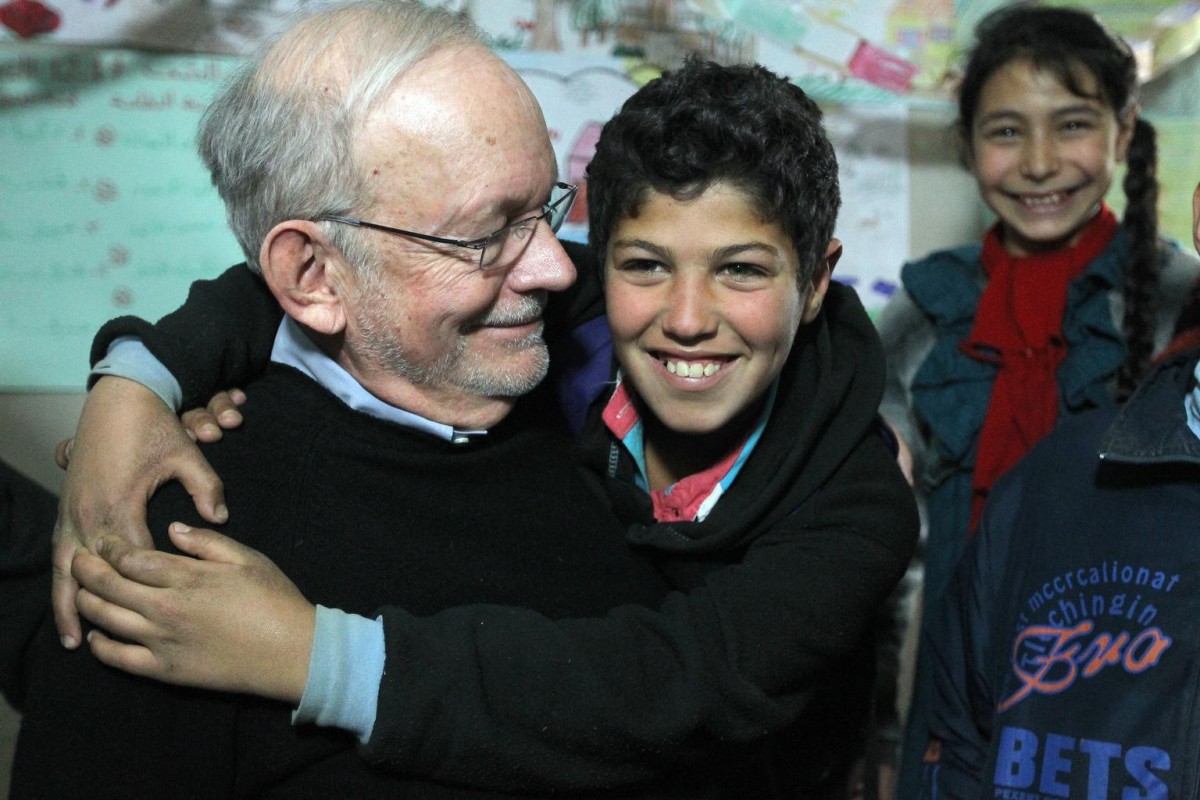 On 14 March, UNICEF Executive Director Anthony Lake smiles as a boy embraces him, at a non-formal school in the Faida informal tented settlement for Syrian refugees, in the Bekaa Valley. A girl smiles while standing nearby. The school, which is run by the NGO Beyond Association with UNICEF support, provides basic education classes and child protection activities.

On 14 March 2014 in Lebanon, UNICEF Executive Director Anthony Lake  together with Chief Executive of Save the Children UK Justin Forsyth, United Nations High Commissioner for Refugees António Guterres, Mercy Corps Vice President of Global Engagement and Policy Andrea Koppel and World Vision Internationals Regional Leader for the Middle East and Eastern Europe Conny Lenneberg  made a joint visit to the Bekaa Valley. The five organizations are united in calling for an immediate end to the fighting in the Syrian Arab Republic, where the continuing humanitarian crisis has forced more than 2.5 million people to flee to nearby countries. Lebanon is currently hosting over 491,700 of those refugees. The conflict  which enters its fourth year on 15 March  has also displaced more than 6 million people, one third of them children, inside the Syrian Arab Republic.