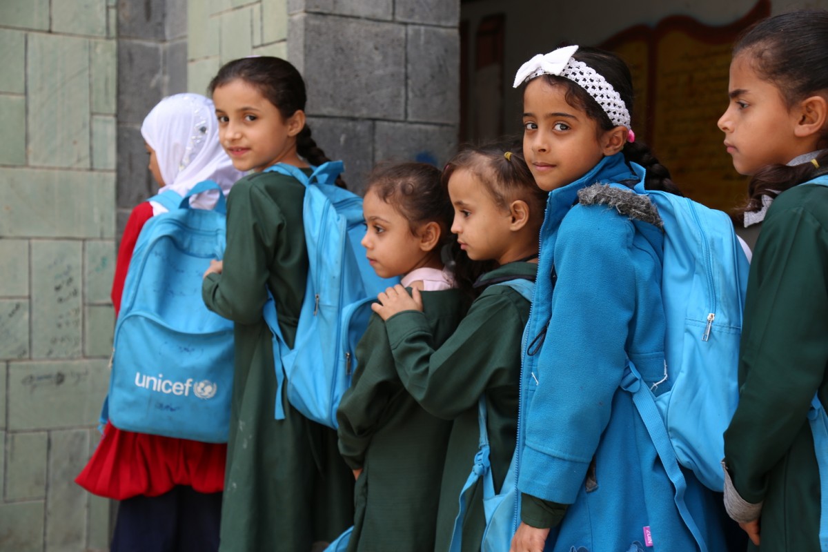 Students who received school bags provided by UNICEF line up at Al-Saeed School in Ibb, Yemen, Tuesday 12 January 2016.

As of November 2016, almost two years of conflict in Yemen have left 18.8 million people - some 70 per cent of the population - in need of humanitarian assistance. After the United Nations-backed peace talks were suspended in August 2016, airstrikes and hostilities intensified and civilians are paying the price. Close to 4,000 civilians have died as a direct result of the conflict, including 1,332 children. At least 14.5 million people lack access to safe water and sanitation and 14.8 million have limited or no access to health services, compounding a cholera crisis that has put 7.6 million people at risk. The nutrition situation has deteriorated, with 3.3 million children and pregnant or lactating women suffering from acute malnutrition and more than 460,000 children under 5 suffering from severe acute malnutrition (SAM). The near collapse of national services has left an estimated 2 million children out of school. Almost 2.2 million internally displaced persons, nearly half of them children, as well as 1 million returnees and many host communities are also in need of assistance. Ongoing conflict and the deteriorating economic situation have put essential public services such as health on the verge of collapse, leaving children and women at even higher risk.
