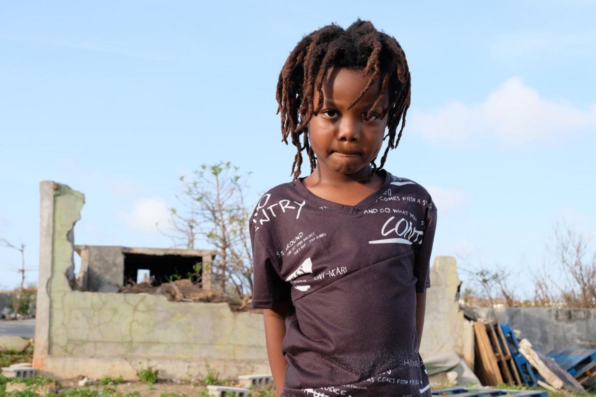 On 11 September, TJ Hickson, 5, stands outdoors near a partially destroyed brick building, in South Hill District, on the island of Anguilla – which was hard hit during Hurricane Irma.

On 6 September 2017, Hurricane Irma, the strongest hurricane ever recorded in the Atlantic, pummelled islands in the Eastern Caribbean. The category 5 storm left a path of destruction in its wake – especially on Anguilla, the British Virgin Islands, Barbuda and Turks and Caicos Islands. Irma disrupted communication networks in many areas and damaged or destroyed infrastructure, including roads, bridges, hospitals and schools. At least 2.4 million children across the Caribbean islands devastated by Hurricane Irma are estimated in need of urgent humanitarian assistance. “We are still far from having a full picture of the extent of damage across the region,” said UNICEF Representative for the Eastern Caribbean Area Khin-Sandi Lwin. UNICEF priorities include providing safe drinking water for affected communities and psychosocial support for affected children and their families, as well as supporting the rehabilitation of schools and the establishment of child-friendly centres in order to restore education. UNICEF is accelerating its efforts to help children cope with their experiences. Together with local authorities and partner organizations, UNICEF is working to ensure that children gain access to psychosocial support services and to safe spaces to play and participate in activities such as art therapy classes.