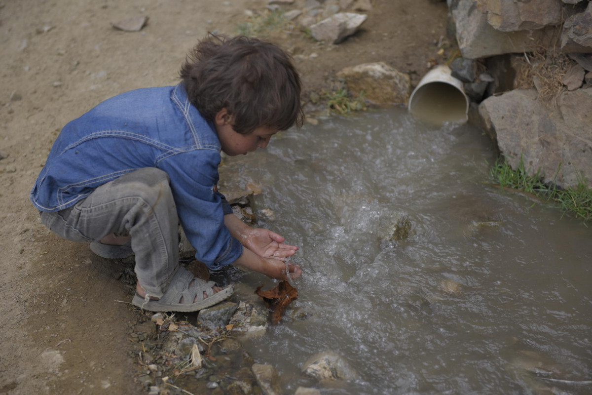 A child washes his hands in untreated water coming from a sewer pipe in Amran Governorate, Yemen, Tuesday 24 October 2017. Contaminated water can transmit diseases such diarrhoea, cholera, dysentery, typhoid, and polio.

A three-day National Polio Immunization Day (NID) campaign was launched to coincide with World Polio Day on 24 October 2017 in Yemen by local health authorities, with support from UNICEF, the World Health Organization, and World Bank, in partnership with Global Polio Eradication Initiative partners. The campaign aimed to reach 5.3 million children under five across Yemen by mobilising around 40,000 vaccination volunteers to visit 3.4 million household in all 23 governorates. In addition to receiving the bivalent oral polio vaccine (bOPV), the nutritional status of children was measured through Middle Upper Arm Circumference - those found to be malnourished were referred to therapeutic centers for treatment.