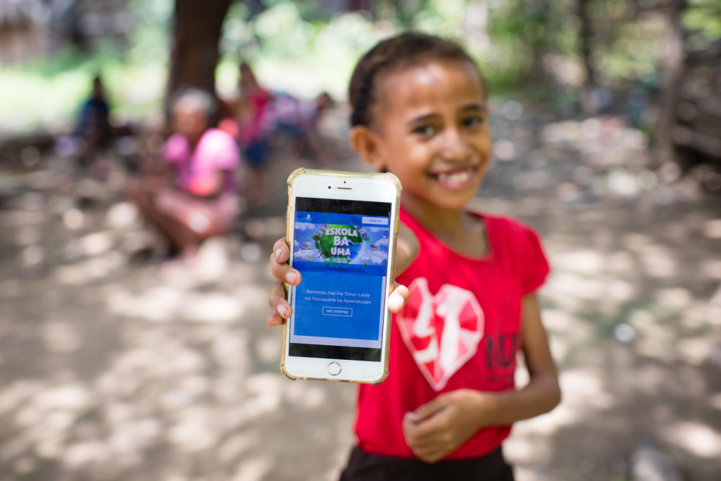 On 14 April 2020, a girl shows off the online platform on which children and parents in Timor-Leste can access a range of audio-visual material to help students continue learning during ongoing school closures. Television programmes, radio programmes and e-books, as well as a book for parents to explain COVID-19 to children with neurodevelopmental needs, are available on the Learning Passport platform developed by Microsoft, UNICEF and the University of Cambridge. Schools in Timor-Leste have been closed since 23 March 2020 as part of national efforts to prevent the spread of COVID-19.