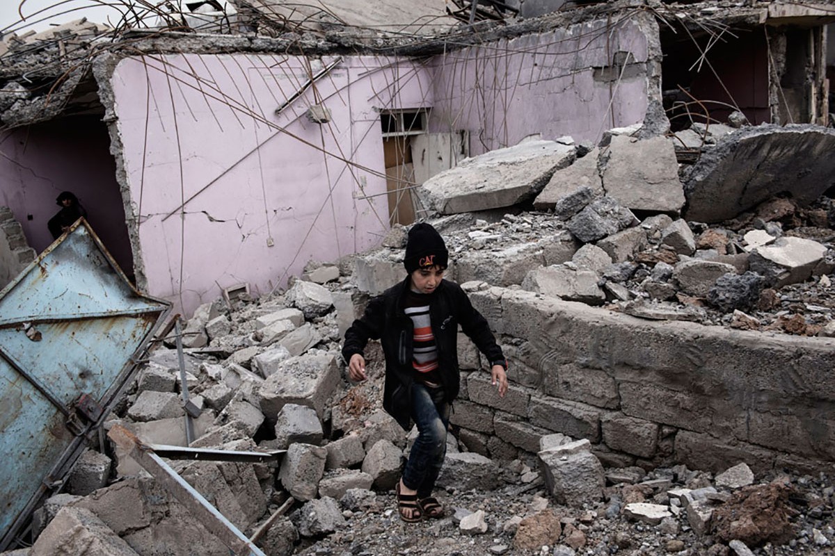 An Iraqi child walks through the rubble of a building which was destroyed in an airstrike, as fighting between Iraqi security forces and ISIS continues, western Mosul, Iraq, Saturday 11 March 2017.

Over 224,298 persons are still internally displaced from Mosul and surrounding areas since the military operations began on 17 October 2016, according to a UNHCR update from 14 March 2017. Operations to retake west Mosul began on 19 February and significant population movements started on 25 February, with around 5,000 persons received in camps daily. UNICEF reported on 3 March 2017 that some 15,000 children had fled the western section of Iraq’s Mosul city in the previous week, where fighting between the Government forces and ISIS is intensifying by the day.