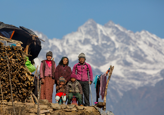 On 16 January 2016, Dhan Bhadur Gurung, aged 32, stand on crutches along with his family member at his temporary shelter in Gupsi Pakha, in Laprak, in Gorkha district, Nepal. Dhan Bhadur is the only source of income for his five members family, but during April 2015 earthquake he lost his house and also broke his leg, since then he is not able to generate any income for his family. Purnimaya Gurung, aged 69, a mother of Dhan Bhandur, has received the emergency top-up cash grant provided by UNICEF. Laprak is one of the epicenter villages of Gorkha district, where more than 600 hundreds houses were destroyed during earthquake on 25 April 2015. Hundreds of earthquake victims, particularly the elderly and young children living in shelter of highland altitude have been facing a harsh winter season after snowfall.