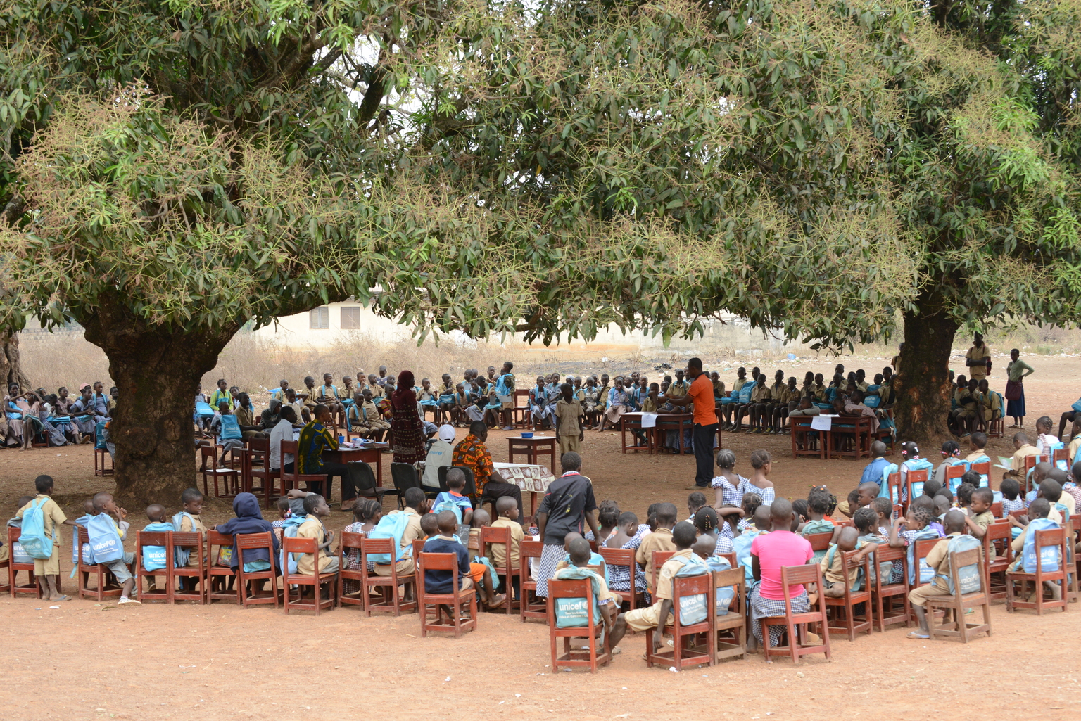 Children gather for a reading club at a primary school in Koro, near Touba, Côte d'Ivoire, Friday 19 Feuary 2016. After years of conflict Côte dIvoire is now repositioning itself in Africa with the aim of becoming an emerging economy by 2020. With economic growth estimated at 9 percent, investors are streaming in. Yet nearly 50 percent of the population still lives in poverty. Maternal and child mortality, education, health care and protection of women and children remain key challenges. Significant progress has been made in Côte d'Ivoire since education became compulsory for children aged 6 to 16 in 2015 - the enrolment rate rose from 79% in 2015 to 88% in 2016. However, the number of children out of school remains high, especially in the northern and the western regions of the country. UNICEF is supporting the development of the Education Sector Plan (20162026) and also helping the Ministry of Education and partners to identify and address the reasons why children are not in school. One of the challenges Côte d'Ivoire still has to address is gender disparity. When faced with the choice, parents routinely choose to send boys to school before girls, a gap which widens significantly at secondary school level. Girls are also more likely to drop out of school because of early pregnancy and marriage, to care for younger siblings or to undertake other household chores.