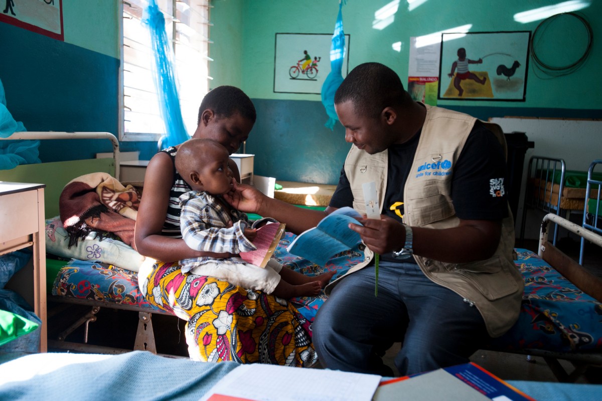 On 28 June 2016, Felegesi Norman, 36, holds her son Brian Norman, 18 months, on her lap as UNICEF Food Management and Nutrition Officer Misheck Mwambakulu, 28, greets Brian at the Balaka district hospital in Malawi. 

The 2015-2016 El Niños devastating impact on children is worsening, as hunger, malnutrition and disease continue to increase following the severe droughts and floods spawned by the event, one of the strongest on record. There is a strong chance La Niña  El Niños flip side  could strike at some stage this year, further exacerbating a severe humanitarian crisis that is affecting millions of children in some of the most vulnerable communities, UNICEF said in a report called Its not over  El Niños impact on children. 

Children in the worst affected areas are going hungry. In Eastern and Southern Africa  the worst hit regions  some 26.5 million children need support, including more than one million who need treatment for severe acute malnutrition.  In many countries, already strained resources, have reached their limits, and affected families have exhausted their coping mechanisms  such as selling off assets and skipping meals. Unless more aid is forthcoming, including urgent nutritional support for young children, decades of development progress could be eroded.

The 2015-2016 El Niños devastating impact on children is worsening, as hunger, malnutrition and disease continue to increase following the severe droughts and floods spawned by the event, one of the strongest on record. There is a strong chance La Niña  El Niños flip side  could strike at some stage this year, further exacerbating a severe humanitarian crisis that is affecting millions of children in some of the most vulnerable communities, UNICEF said in a report called Its not over  El Niños impact on children. 

Children in the worst affected areas are going hungry. In Eastern and Southern Africa  the worst hit regions  some 26